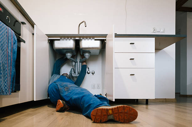Professional Emergency Plumber technician working in Haworth, NJ